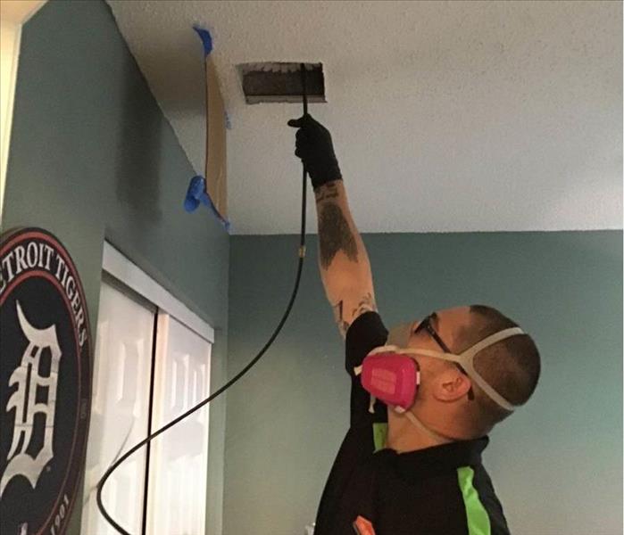 SERVPRO of Weston/West Davie is using high tech duct cleaning equipment to hepa vacuum the duct work in this West Davie home