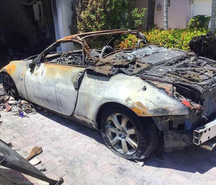 After fire damages to car in the garage